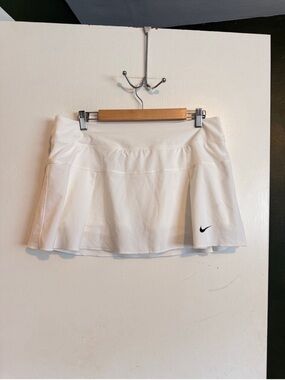 Nike white short tennis skirt with built in shorts 
size large